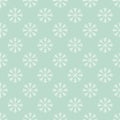 Vector illustration snowflakes seamless repeat pattern on a light green background.