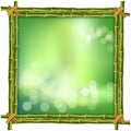 Square green bamboo stems border frame with bokeh background Royalty Free Stock Photo