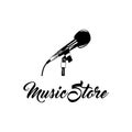 Vector illustration of vintage Microphone. Music Store logo badge label. Royalty Free Stock Photo