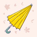 Vector illustration of yellow folded umbrella in doodle style isolated on a light background with autumn leaves Royalty Free Stock Photo