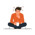 Young man with cold symptoms such as headache and sore throat and holding a cup of tea. Guy feeling vertigo