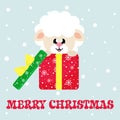 Cartoon cute sheep black sitting in christmas gift Royalty Free Stock Photo