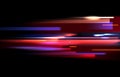 Vector image of colorful light trails with motion blur effect, long time exposure. Isolated on black background Royalty Free Stock Photo