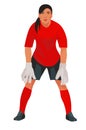 Asian women's football girl goalkeeper in red uniforms stands in goal and waits for the ball