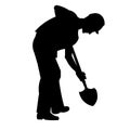 Vector isolated silhouette of a worker in work clothes digging a hole with a shovel, profile view Royalty Free Stock Photo