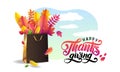 Vector Lettering handwritten text Happy Thanksgiving. Bright bouquet of autumn fallen leaves in gold gift shopping bag.