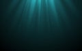 Vector Light Rays in Dark Turquoise Underwater Ocean Background. Deep Sea Stormy Water with Plankton Dust Particles. Sun Light Royalty Free Stock Photo
