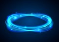 Vector magic blue circle. Glowing fire ring trace on black background. Ellipse line with flying sparkling flash lights. Royalty Free Stock Photo