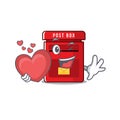 Vector mailbox with a the holding heart mascot Royalty Free Stock Photo