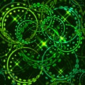 Vector metallic stars and rings in green hues on a sparkling background. Seamless pattern for decoration of fashion and beauty