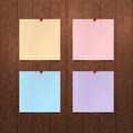 Vector mockup. Sheets of color paper with a red push pins hanging on a brown wooden wall. Empty blanks, notes.