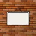 Vector mockup. Simple white sign hanging on a dark red brick wall. Empty blank. Grunge brickwork background Royalty Free Stock Photo