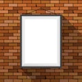 Vector mockup. White poster with black frame hanging on a dark red brick wall. Empty blank. Grunge brickwork background Royalty Free Stock Photo