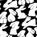 Vector monochrome seamless pattern with rabbits in various poses. Texture with tight white hares on black background. Childish