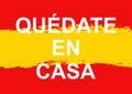 Vector motivational poster Quedate en casa, english translation Stay Home on flag of Spain.