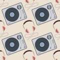 Vector music seamless pattern with vinyl record players and headphones Royalty Free Stock Photo