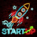 Vector neon sign of rocket and clouds for decoration on the wall background. Realistic neon logo for startup.