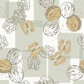 Vector Nuts Walnuts in Brown Tan on Green Squares Background Seamless Repeat Pattern. Background for textiles, cards