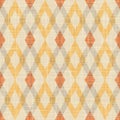 Vector orange brown fabric texture ikat diamond tribal seamless pattern. Elegant retro background. Royalty Free Stock Photo