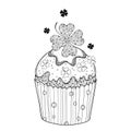 Vector outline cupcake with ornate lucky clover or shamrock in black isolated on white background. Traditional symbol.
