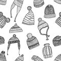 Seamless background of the knitted caps sketches