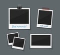 Vector photo frames sticked with tape and hanged on paper clip. Retro fotos. Dark background.