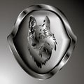 Vector picture. One silver shield symbol of the wolf.