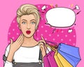 Pop art surprised girl holding shopping bags Royalty Free Stock Photo