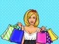 Vector pop art illustration of a young happy girl holding shopping bags. Royalty Free Stock Photo