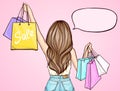 Pop art girl holding shopping bags Royalty Free Stock Photo