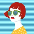 Redhead woman with sunglasses