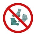 Vector prohibition sign with socks. Warning sign to clean up dirty clothes. Red forbidden sign