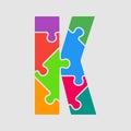 Vector puzzle piece letter - K. Jigsaw font shape. Royalty Free Stock Photo