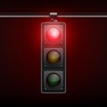 Vector Realistic Hanging Traffic Light with Glowing Red Prohibiting Signal Isolated on Black Background Royalty Free Stock Photo