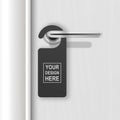 Vector realistic paper black blank door hanger on white realistic wooden door with metal silver handle. Door hanger