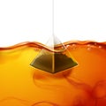 Vector realistic pyramid teabag dipped into water