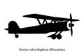 Vector retro biplane silhouettes set.vector illustrated propeller powered aircraft Royalty Free Stock Photo