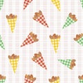 Vector roasted almond nuts in cute gingham paper bags seamless pattern background. Brown oval seeds on pastel plaid Royalty Free Stock Photo