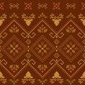 Vector rustic seamless pattern with rhombuses, stylized deers and berries. Brown and green ornate geometric background Royalty Free Stock Photo