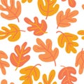 Vector seamless Autumn pattern of fall leaves. Oak leaf seaonal background red, yellow, gold, and white for textile, digital paper Royalty Free Stock Photo