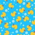 Vector seamless background with yellow rubber duck toy