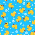 Vector seamless background with yellow rubber duck toy