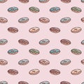 Vector seamless cartoon pattern. Cute doodle images of colorful donuts with frosting. Background or wrapping paper decoration Royalty Free Stock Photo