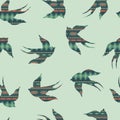 Vector seamless decorative ethnic pattern with swallows Royalty Free Stock Photo