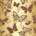 Vector seamless golden pattern with silhouettes of flying colorful butterflies Royalty Free Stock Photo