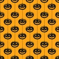 Vector seamless halloween pattern. Icons scary pumpkins on stripes. Royalty Free Stock Photo
