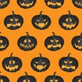 Vector seamless Halloween pattern with scary black pumpkins on orange background. Royalty Free Stock Photo