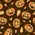 Vector seamless Halloween pattern with scary pumpkins on brown background.