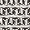 Vector seamless hand drawn pattern. Zigzag and stripe rough lines. Tribal design background. Ethnic doodle texture. Royalty Free Stock Photo