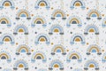 Vector seamless pattern of abstract rainbows with clouds, raindrops and stars in yellow and gentle blue colors on a light gray bac Royalty Free Stock Photo